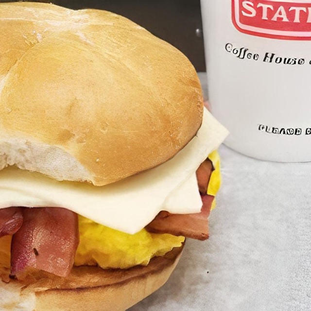 Egg, cheese and bacon sandwich on a toasted English muffin